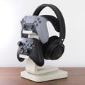 All-in-One Headset and Controller Gaming Stand with headsets and controllers organized neatly.