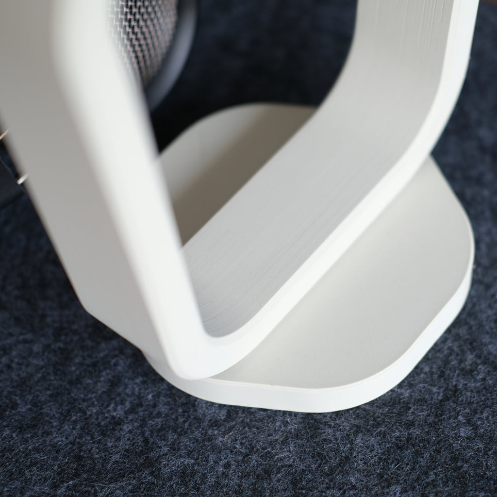 Headphone Display Stand showcasing modern design with sleek lines and stable base, ideal for organizing headphones neatly.