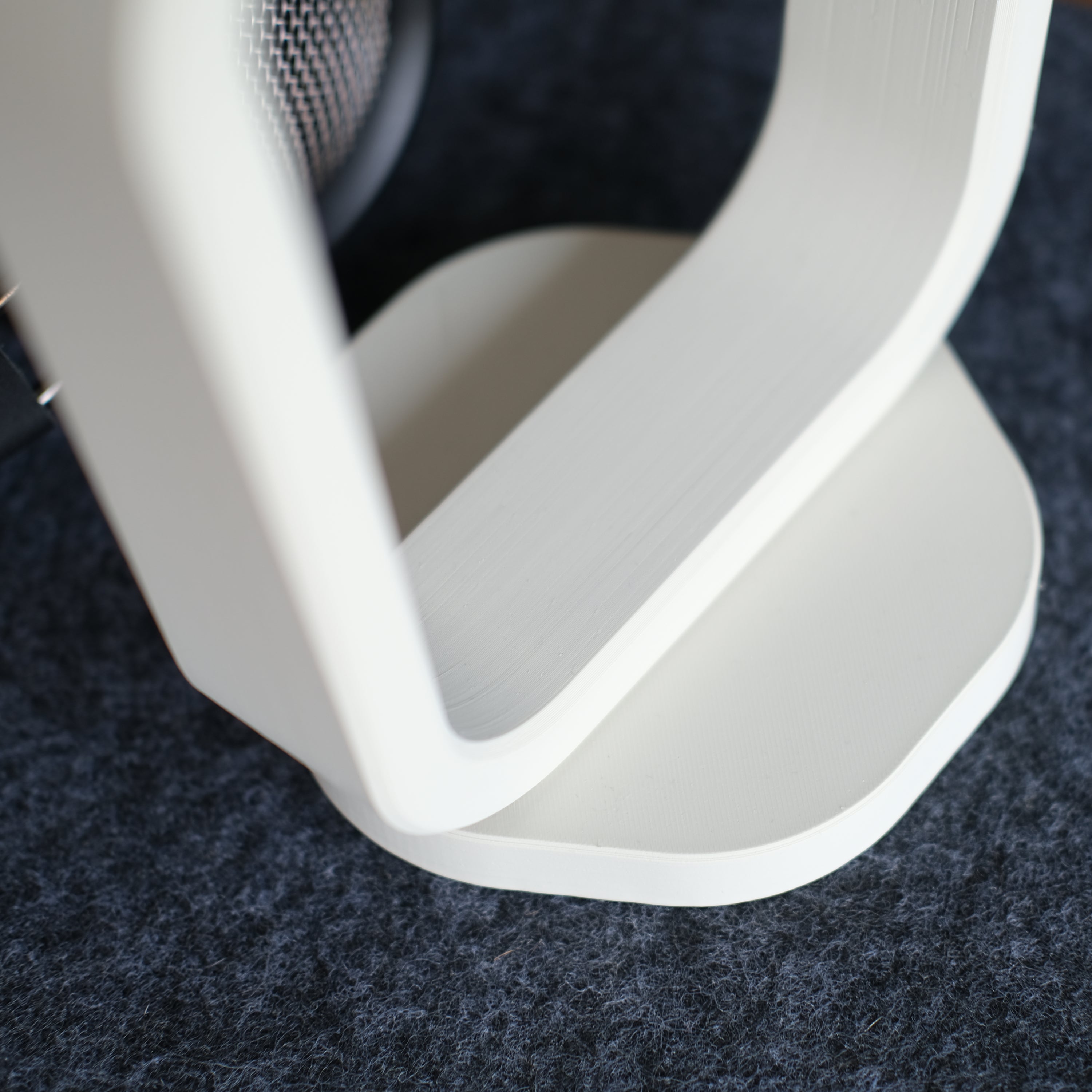 Headphone Display Stand showcasing modern design with sleek lines and stable base, ideal for organizing headphones neatly.