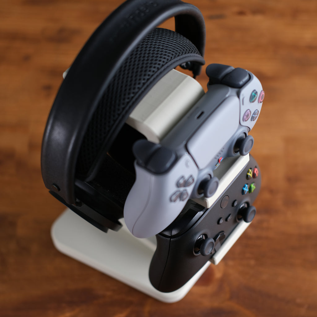 All-in-One Headset and Controller Gaming Stand with headsets and controllers organized neatly.